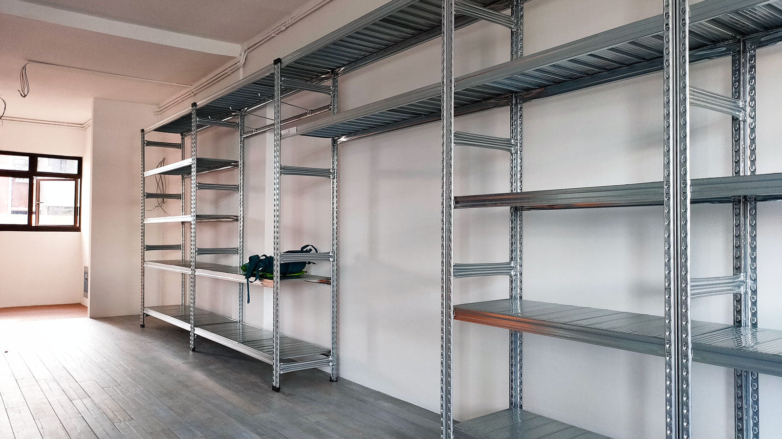 Boltless Rack Row with Reinforcement Bar and Hooks in Living Room by SIM WIN LIANG