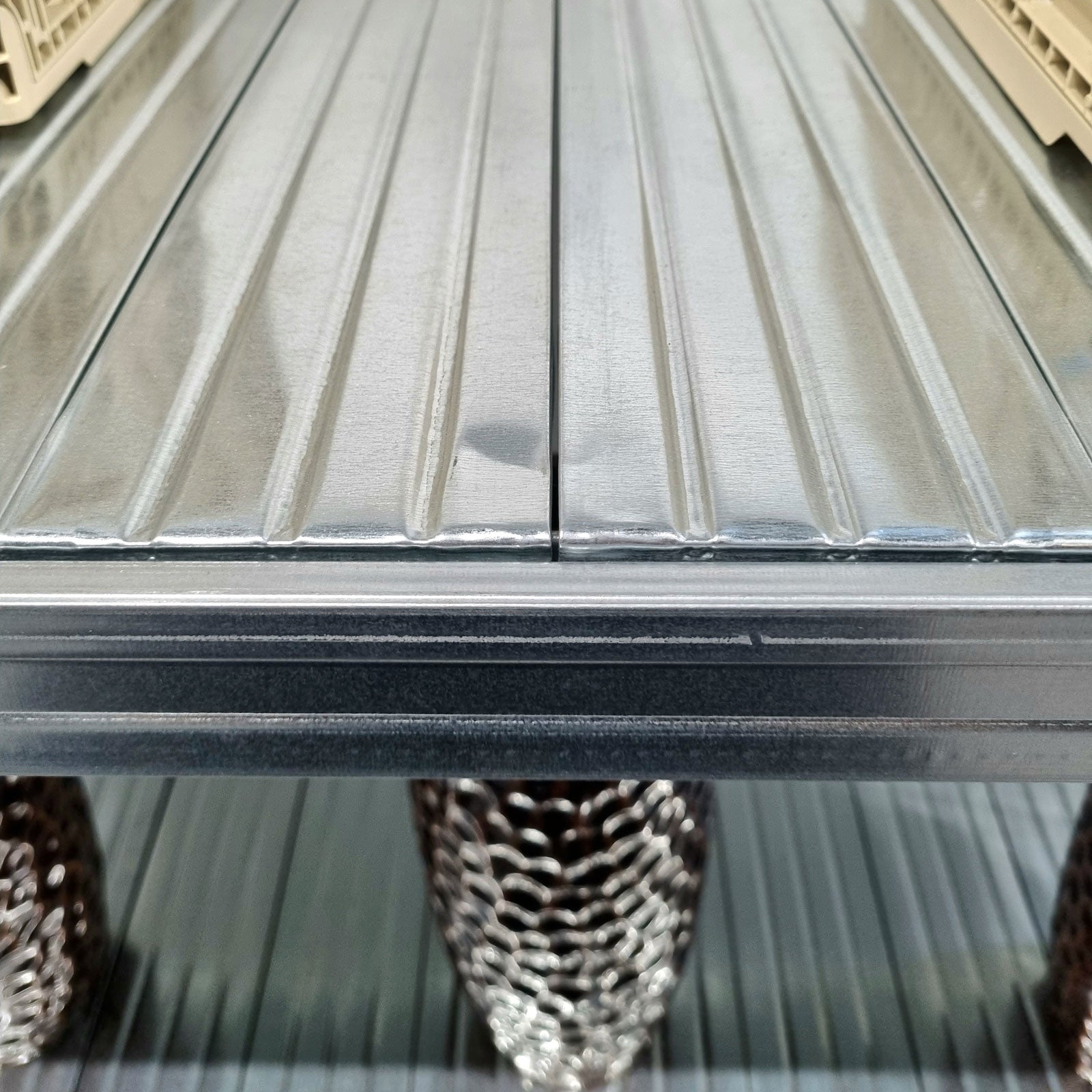 A close up image of a Galvanized Steel Boltless Rack Shelf Level - SIM WIN LIANG Singapore